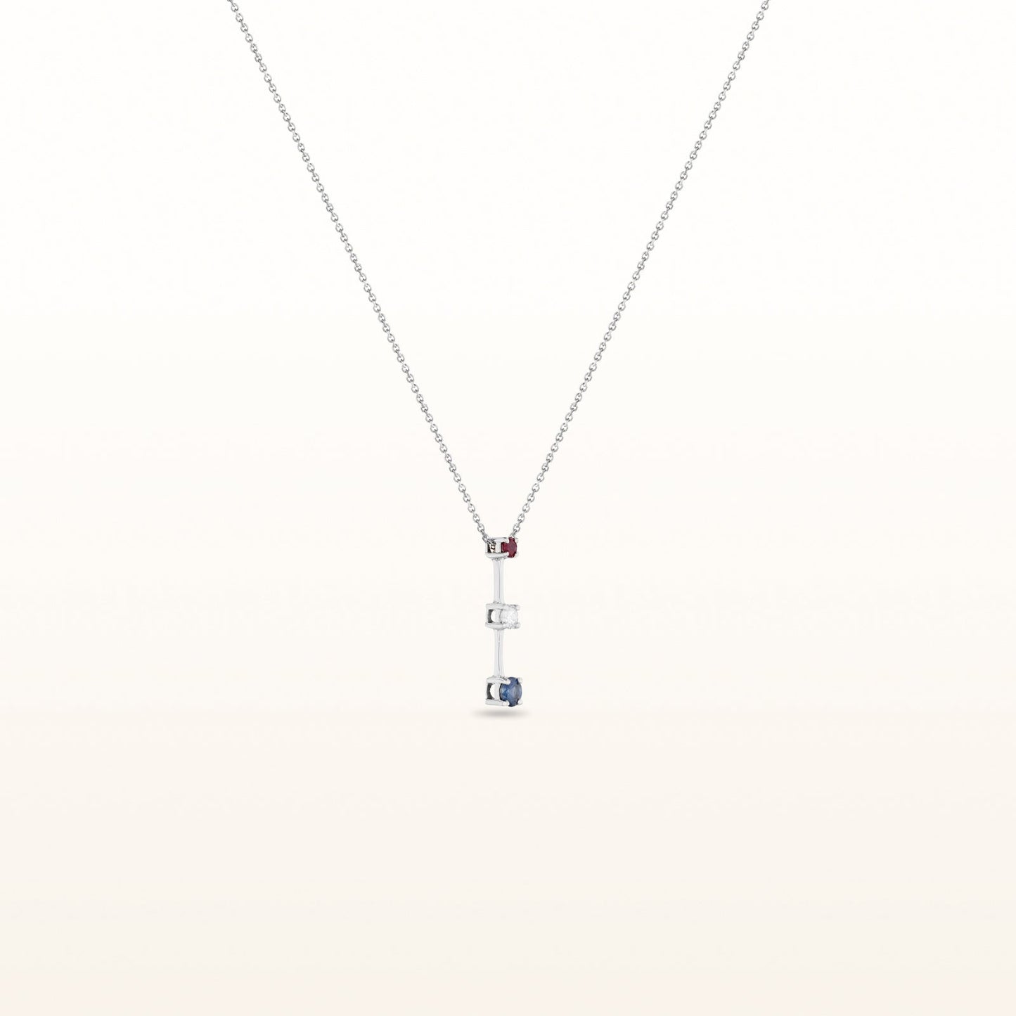 Diamond, Ruby, and Blue Sapphire Three-Stone Pendant in 14kt White Gold